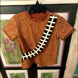Taylor Joelle
Fuzzball tee aka Wookie tee 
Size 5 brown multiple color